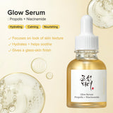 a bottle of serum with a dropper