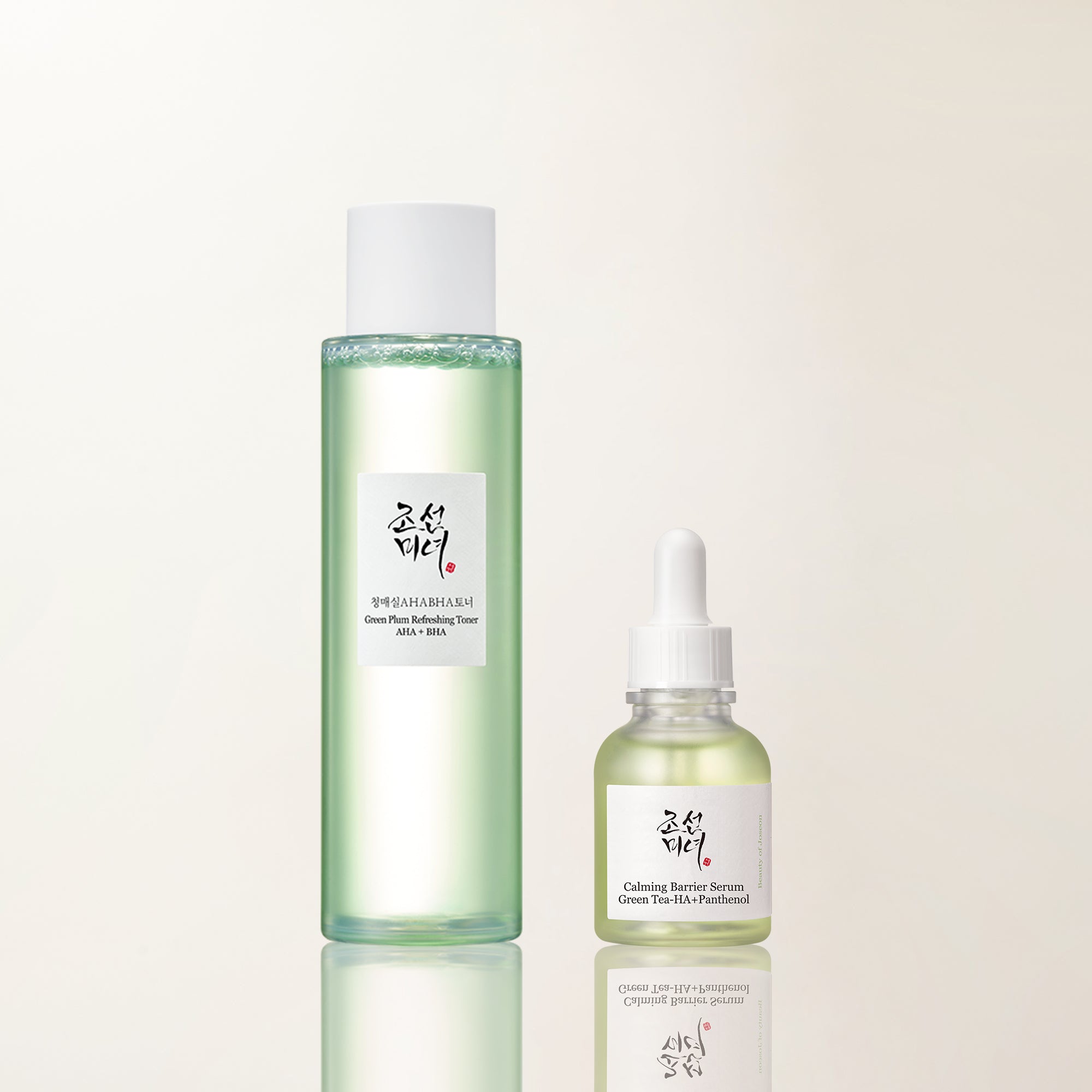 a bottle of liquid next to a dropper