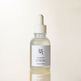 a bottle of liquid with a dropper